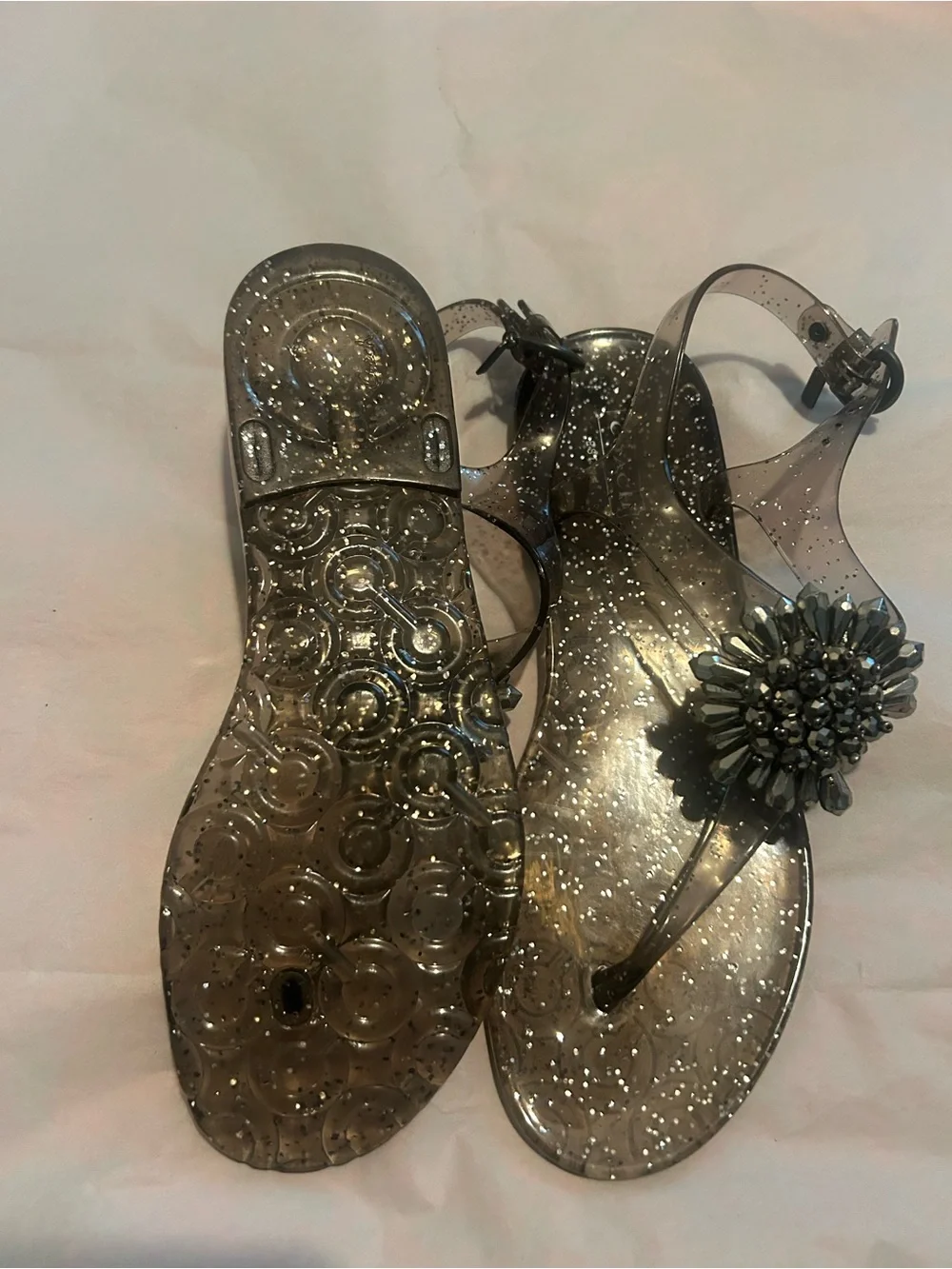 Coach Glitter Jelly T-Strap Sandals in Smoke with Jeweled Flower